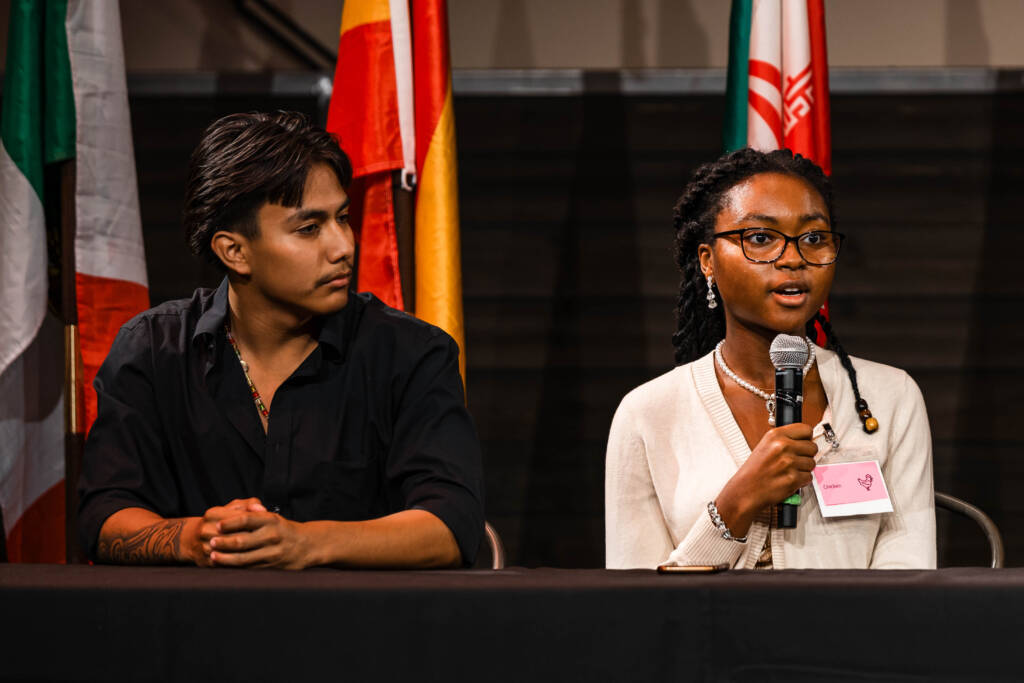 MNUDL students speaking at panel