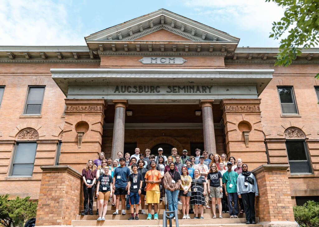 Debaters smile on Augsburg University's campus
