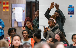 Debate coaches cheer at tournament