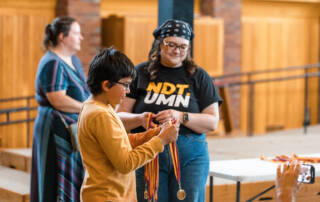 Debater with medal