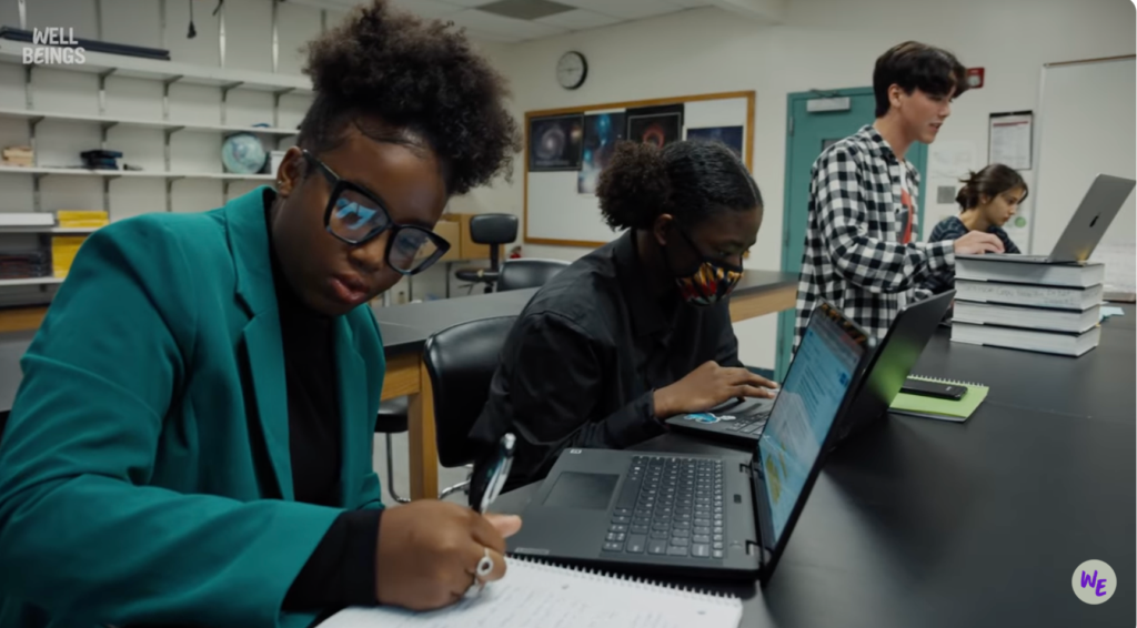 WUDL debaters taking notes