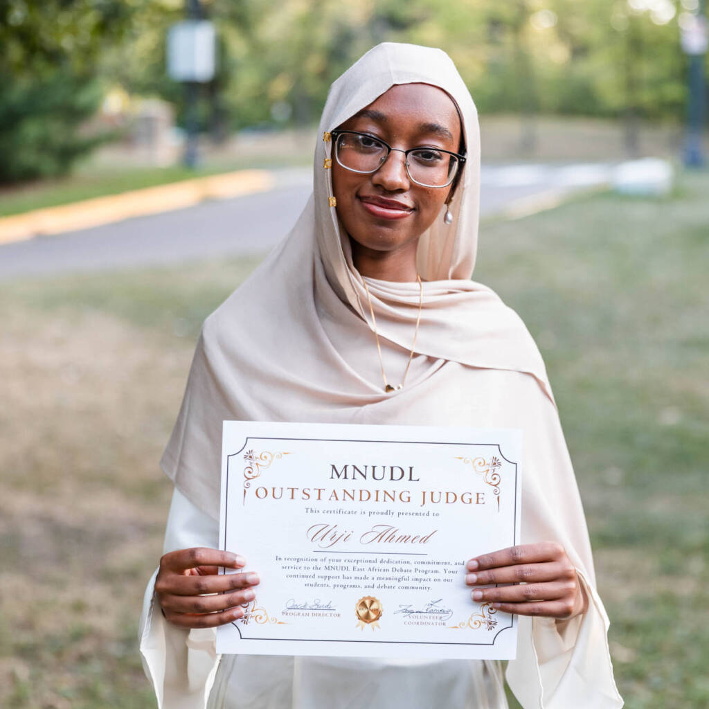 Urji Ahmed with certificate